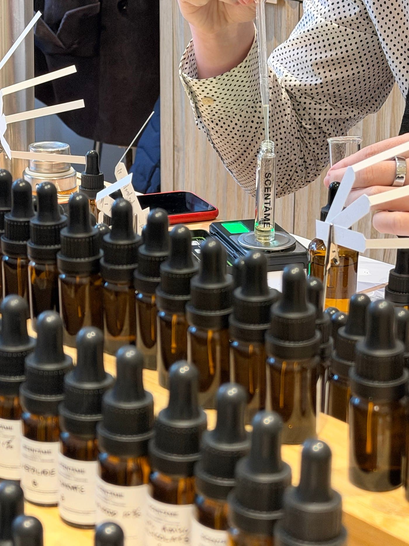 Rows of perfume materials at the atelier